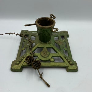 Cast Iron Christmas Tree Stand with Pine Cone Decor
