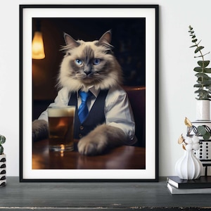 May include: A fluffy, gray and white cat wearing a blue tie and a vest, sitting at a bar with a glass of beer in front of it.