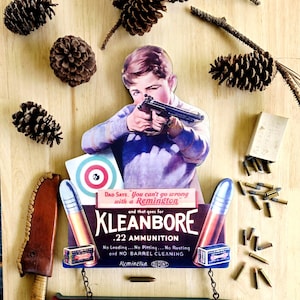 May include: A set of three ceramic mugs with a speckled, matte finish. The mugs are in shades of cream, light gray, and dark gray. Each mug has a simple, minimalist design, perfect for coffee or tea.