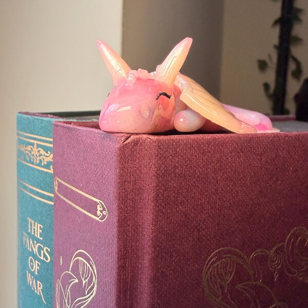 Snoozing dragon bookshelf buddy | candy floss dragon