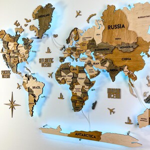 Mapa del mundo de madera iluminado: decoración de pared 3D con retroiluminación LED, mapa de madera natural con chinchetas, regalo de viaje hecho a mano para el hogar o la oficina.