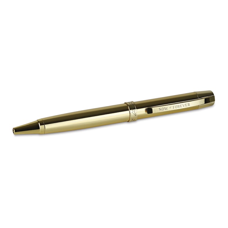 May include: A gold pen with the words "NOW FOREVER" engraved on the side.
