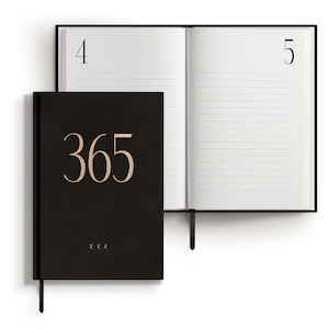 365 Notiz-/Tagebuch A5 – Schwarz / Gold, 365 Linierte nummerierte Seiten, veganer Kunstledereinband, inkl. hochwertiger Geschenkverpackung