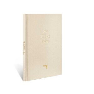 May include: A white leather-bound book with the title "the KILLER" and the text "the KILLER reads" on the spine. A gold gun icon is on the front cover.