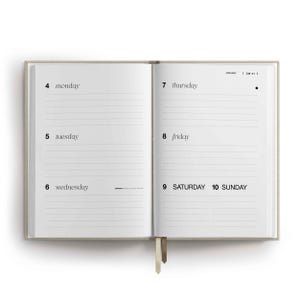 May include: An open planner with a beige cover showing a weekly layout. The left page lists Monday 4, Tuesday 5, and Wednesday 6. The right page lists Thursday 7, Friday 8, Saturday 9, and Sunday 10. The text includes January and CW 01.