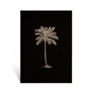 May include: A black card with a gold palm tree illustration.