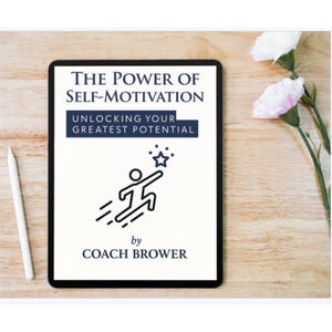 May include: A black tablet displays the book cover "The Power of Self-Motivation: Unlocking Your Greatest Potential" by Coach Brower. The cover features a graphic of a person reaching for a star. A white stylus and flowers are on a wooden surface.