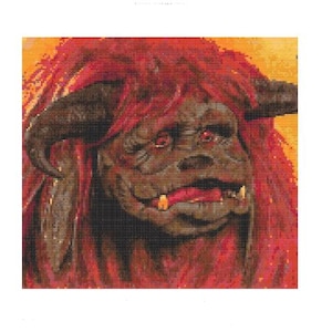 May include: A close-up of a furry, red-haired creature with a large, toothy grin. The creature has a brown face and large, dark eyes.