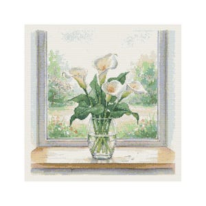 May include: A watercolor painting of a window with a vase of calla lilies. The lilies are white with yellow centers and green stems. The window looks out onto a green landscape. The painting is on a white background.