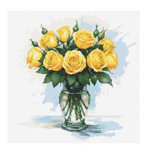 May include: A bouquet of yellow roses in a clear glass vase. The roses are arranged in a loose, natural style, and the vase is simple and elegant.