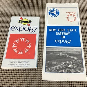 May include: Two vintage Expo 67 brochures. One features the Sunoco logo and the text "expo67" with a red and white design. The other brochure has the text "New York State Gateway to expo67" with a bridge image.