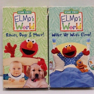 Elmo&#39;s World VHS Lot of 2: Babies, Dogs & More! Wake Up With Elmo! Sesame Street