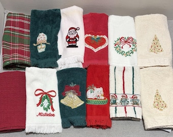 Set di 12 asciugamani decorativi natalizi per bagno e cucina, di varie marche.