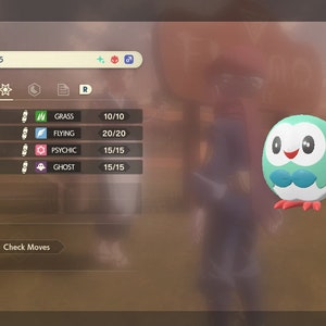 May include: A green and brown video game character named Rowlet, a Grass and Flying type Pokémon, is shown on a screen. The character is level 65 and has learned the moves Leaf Blade, Aerial Ace, Psycho Cut, and Shadow Claw. The screen also shows the character's type effectiveness against other Pokémon types.