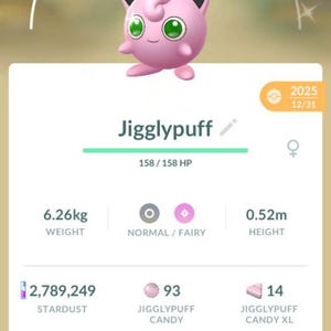 May include: A pink Jigglypuff character from the Pokémon franchise, with a blue bow, green eyes, and a CP of 338. The image displays stats including weight (6.26kg), height (0.52m), and various in-game resources.