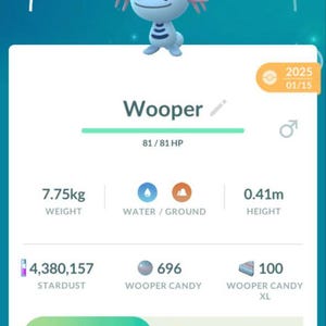 May include: A mobile game screen displays a blue Wooper character wearing a knit cap. The screen shows the character's stats, including weight (7.75kg) and height (0.41m). The game interface includes options to power up or evolve the character.