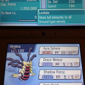 May include: A screenshot of a Nintendo DS game showing a Giratina Pokemon with a Griseous Orb. The Pokemon is level 100 and has the moves Aura Sphere, Draco Meteor, Shadow Force, and Iron Head.