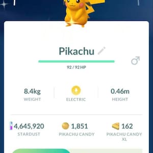 May include: A mobile game screen displays a Pikachu character wearing a hat. The screen shows Pikachu's stats: 8.4kg weight, 0.46m height, and various game resources. The text "Pikachu" is prominently displayed.
