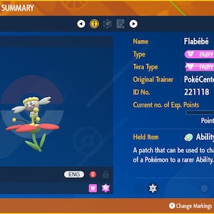 May include: A Flabébé Pokémon, a Fairy type with a pink Tera type, is shown on a blue screen. The Pokémon is level 5 and has 125 experience points. The Pokémon is holding an Ability Patch, which can be used to change the regular Ability of a Pokémon to a rarer Ability.