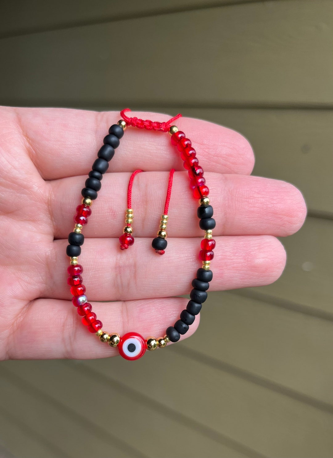 Red and black sale evil eye bracelet