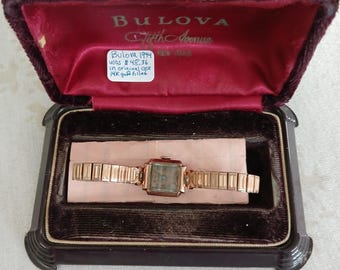 Bulova Ladies Goldtone Diamond Watch With Diamond Bezel  display picture 1