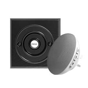 May include: A black doorbell button with a white "PRESS" button in the centre, and a white wireless doorbell chime with volume control buttons.