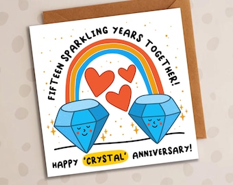 May include: A square greeting card with a brown envelope. The card features a rainbow, three orange hearts, and two blue diamond illustrations. Text reads "Fifteen Sparkling Years Together! Happy 'Crystal' Anniversary!"