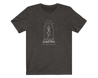 May include: Dark heather grey t-shirt with a white graphic of a plant in a dome with the text "mid90s fall, get back up".