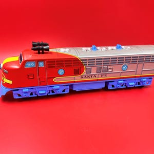Vintage Modern Toys Tin Santa Fe 327 Diesel Locomotive made in Japan Tested - working