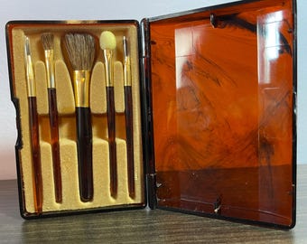 Brochas de maquillaje vintage y brocha retráctil para polvos