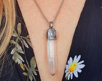 Evil eye and Starbrary Quartz pendant