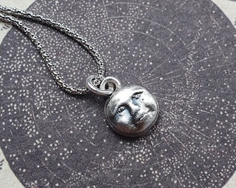 Delicate Moon face pendant