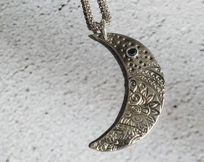 Waxing crescent half Moon pendant with blue Sapphire