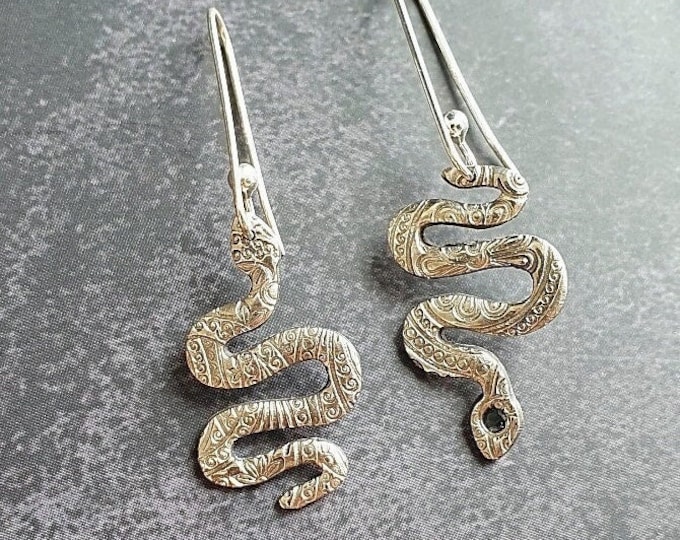 Celestial Snake earrings with blue Sapphire