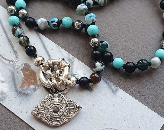 Hand-knotted Onyx and Evil Eye necklace