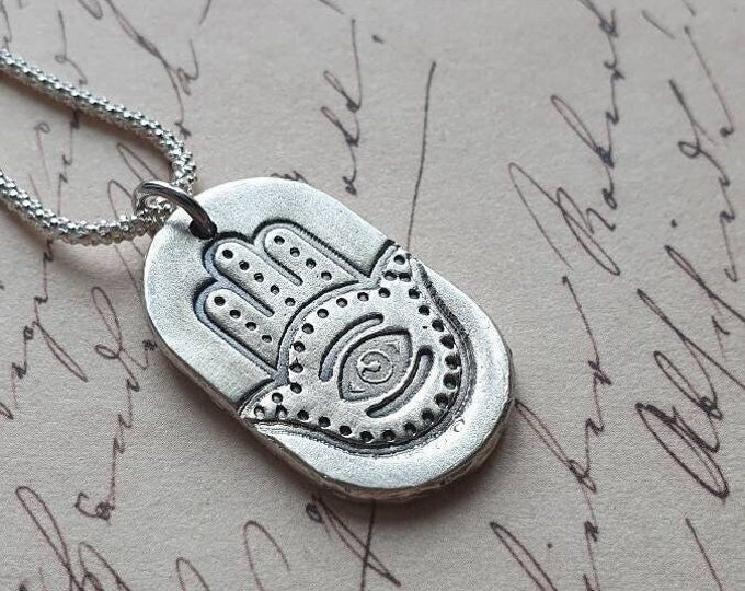 Hamsa hand and evil eye protection amulet necklace
