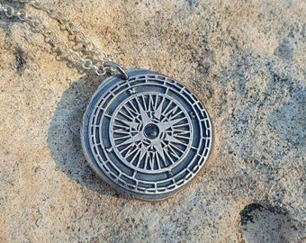 Compass necklace with blue Sapphire