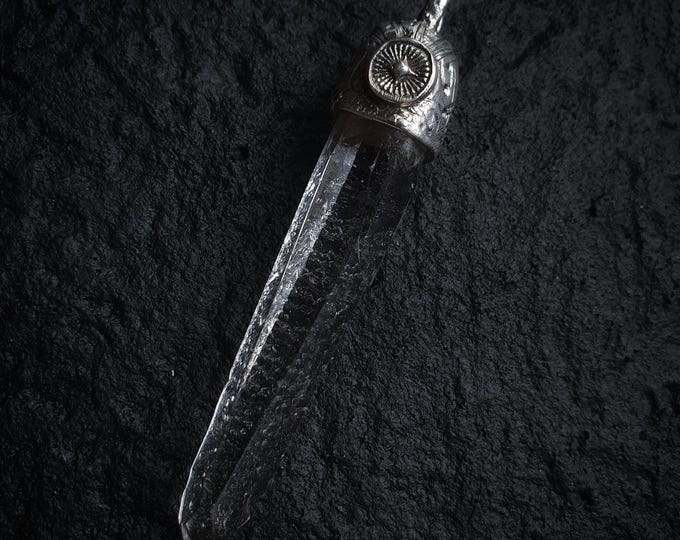 Evil eye and Starbrary Quartz pendant