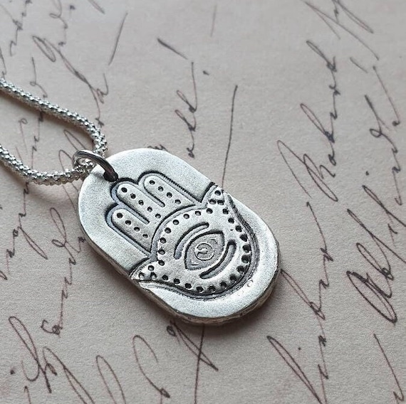 Hamsa hand and evil eye protection amulet necklace