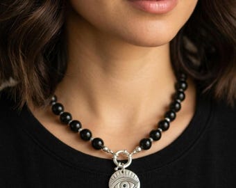 Black Tourmaline Necklace with an Evil Eye Pendant