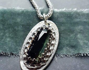 Real flower and Tourmaline pendant