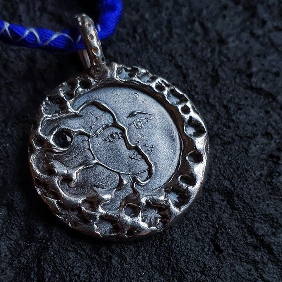 Moon and Sun pendant with Sapphire