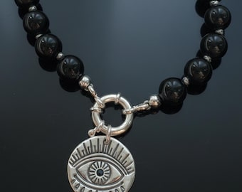 Black Tourmaline Necklace with an Evil Eye Pendant