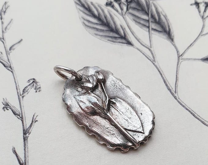 Tiny Floral Pendant