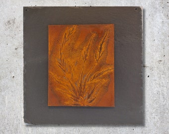 Steel picture with rust. small metal picture on slate, beautiful autumn colors