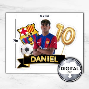 May include: A digital file for a birthday cake topper featuring a soccer player wearing a red and blue jersey with the FC Barcelona logo. The player is holding a soccer ball and the topper also includes a gold number 10 balloon and a black banner with the name "DANIEL" in gold letters.