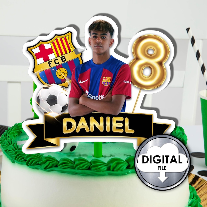 May include: A cake topper featuring a young boy wearing a red and blue soccer jersey with the FC Barcelona logo. The topper also includes a gold number 8 balloon, a soccer ball, and a black banner with the name "DANIEL" in gold letters.