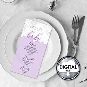 May include: A printable baby shower menu with a purple and white color scheme. The menu features a floral design with the words "Hello Baby" in purple script. The menu includes the following items: Baked Chicken, Baby Glazed Carrots, Seasoned Green Beans, Summer Salad, Rice Pilaf, Rolls, Chocolate Fountain, Candy Bar, Cake, Momosa, and Mocktail.