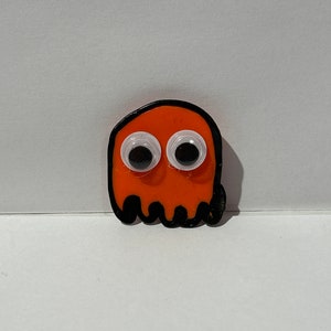 Pac-Man Clyde orange ghost 2D  1 magnetic” clay figurine glazed with goggly eyes
