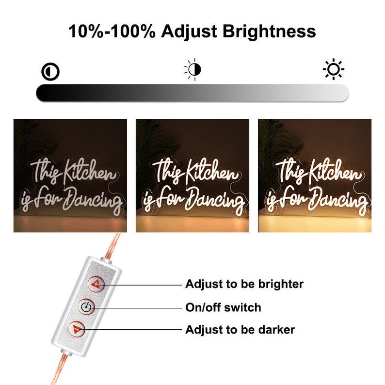 May include: White neon sign with the text "This Kitchen is for Dancing". The sign is on a wooden surface and has a dimmer switch with three buttons: one for on/off, one for brighter, and one for darker. The sign is illuminated and the brightness can be adjusted.